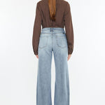 Kan Can High Rise Light Wash Distressed Slim Wide Leg Jeans - The Nines