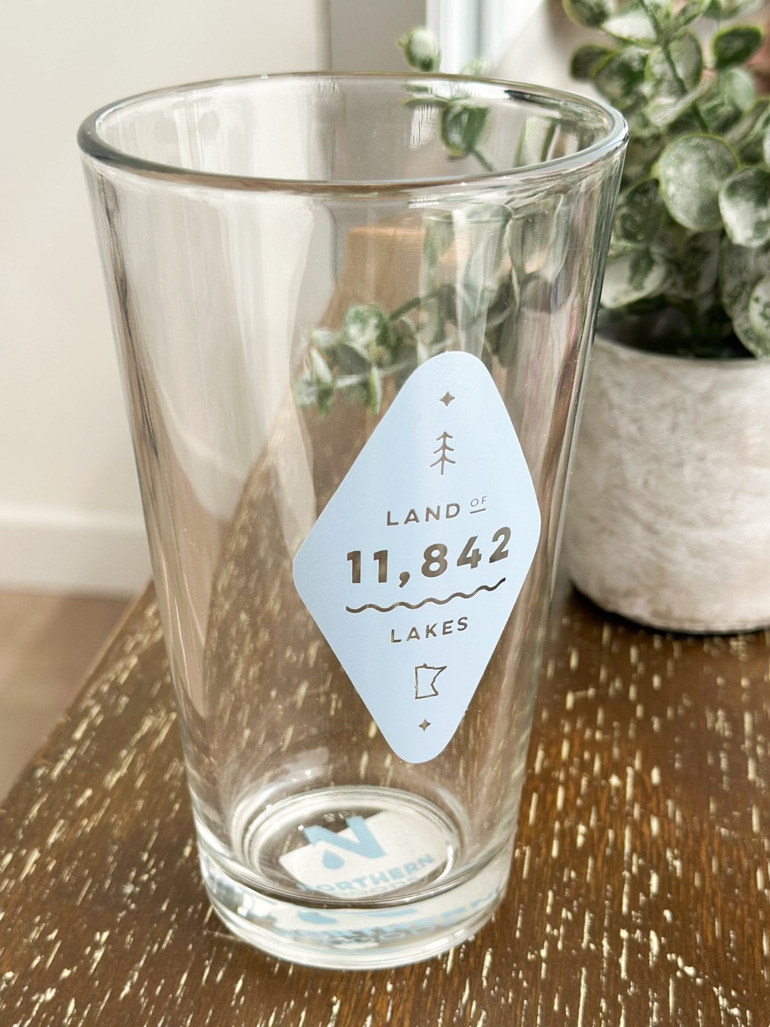 Land Of The Lakes Pint Glass - The Nines